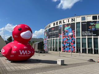 Messe Berlin - the location of the Congress with WeAreDevelopers branding and a huge inflated rubber duck in front of it.